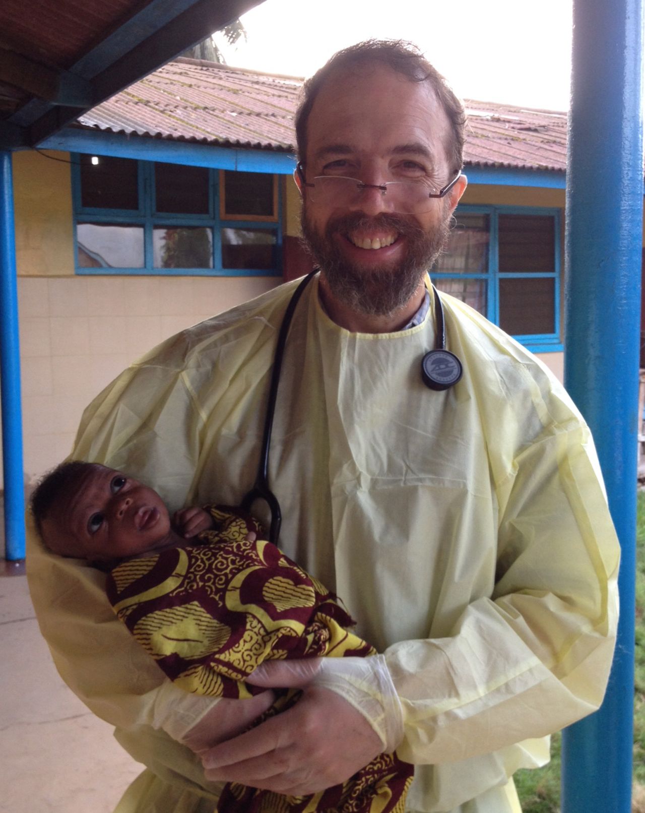 Sacra holds a baby named Noah on the morning of his discharge. For the future, "for the sake of the courageous doctors, nurses, lab technicians and aides who continue to face the same risk I faced, the global community needs to press forward with the task of improving protocols for preventing Ebola in hospitals, clinics and communities," Sacra said. "We need to press on with generous funding for Ebola vaccine and treatment trials so that some good science backed up by data can inform our actions. We should be doing our best to enroll every health worker in Sierra Leone, Guinea and Liberia in a vaccine trial. And even when we get to zero cases of Ebola, we need to turn our attention to training thousands of doctors and nurses to form a stronger health-care work force for these nations, so they will be ready to quickly contain the next outbreak of Ebola or other highly infectious disease." That, he argues, is essential. "If we think about it, we'll realize that we can't afford to do otherwise."