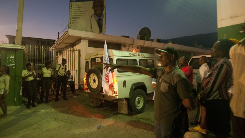 An ambulance carrying injured people arrives at the General Hospital in Port-au-Prince, Haiti, on February 17, 2015.