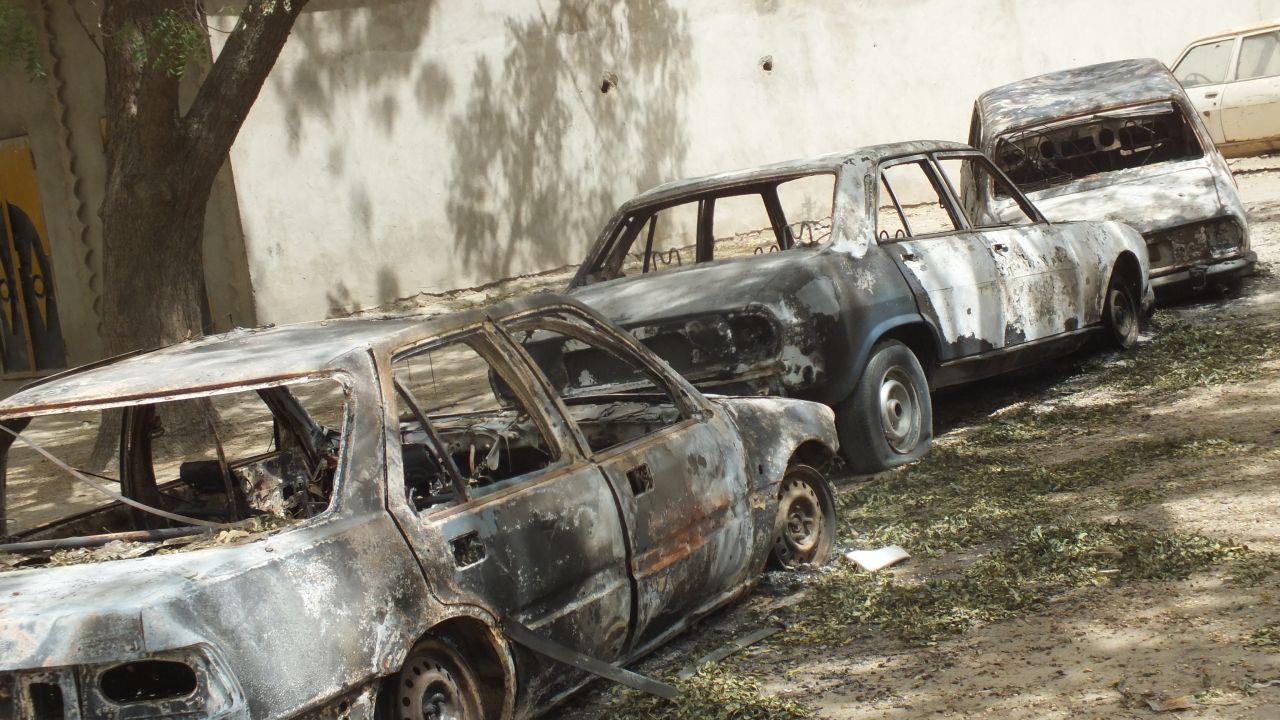 Burned-out cars line the streets of Fotokol, Cameroon.