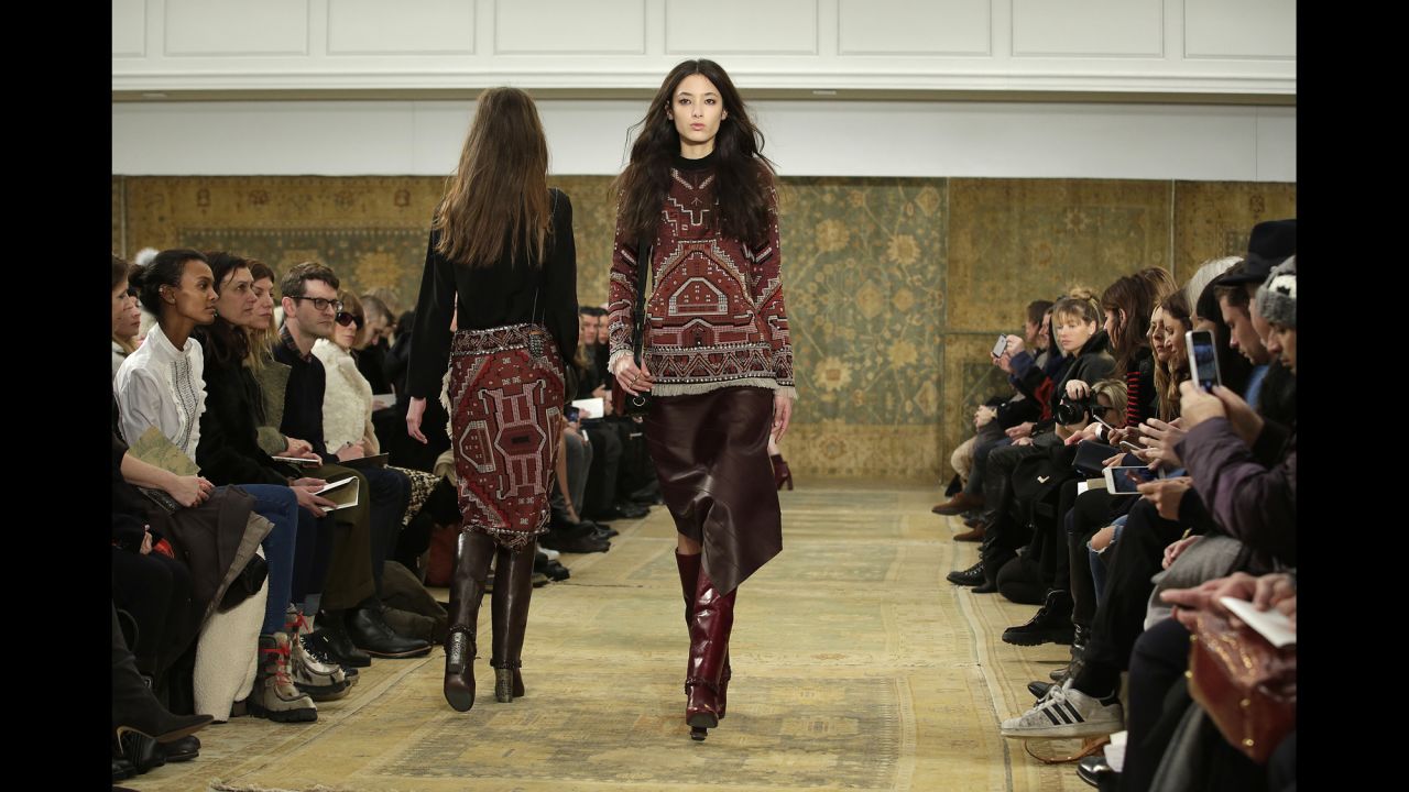 Models stride down the runway in Tory Burch's "Marrakech meets Chelsea" collection.