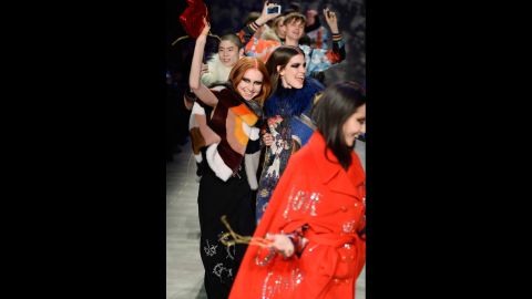 Libertine creative director Johnson Hartig encouraged models on their final walk to be as festive as his graphic fall collection.