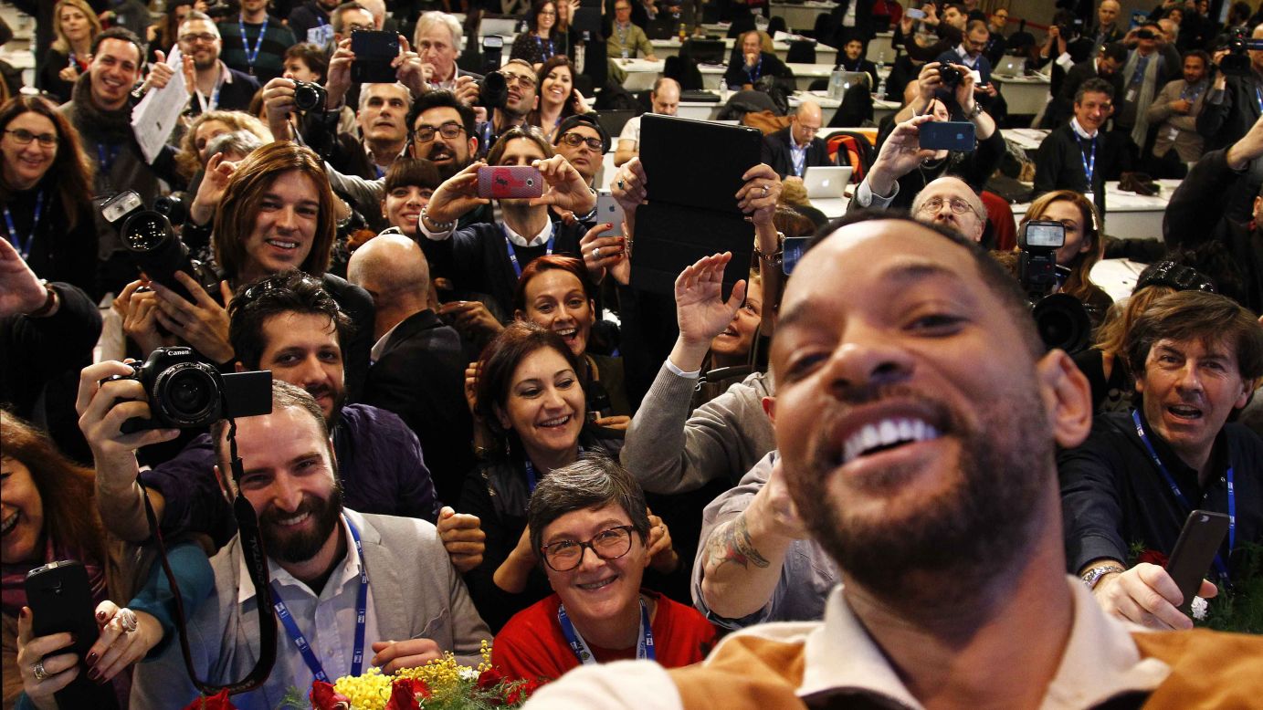 Actor Will Smith turns the camera on the media (and himself) during a press conference in Sanremo, Italy, on Saturday, February 14. Smith was promoting his new movie "Focus."