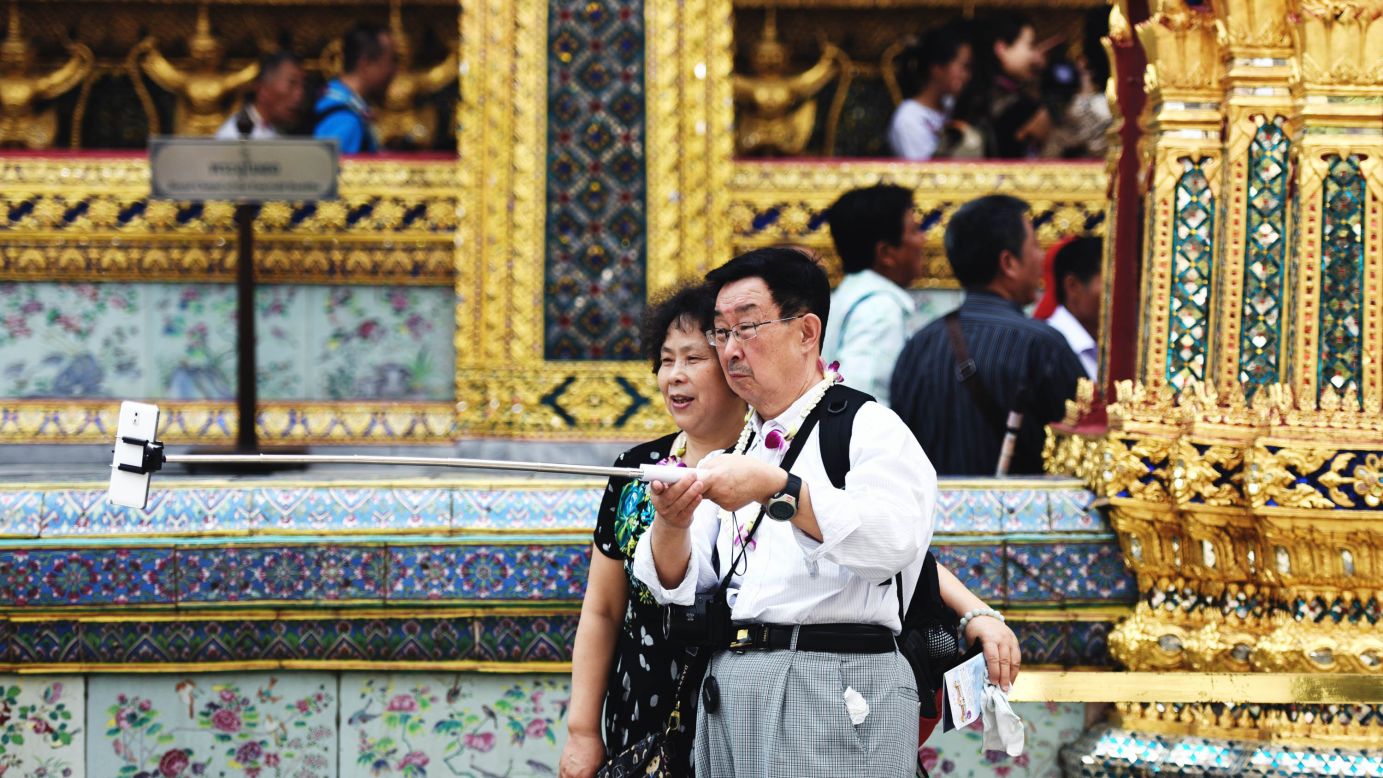 A couple takes a selfie at the Grand Palace in Bangkok, Thailand, on Sunday, February 15.