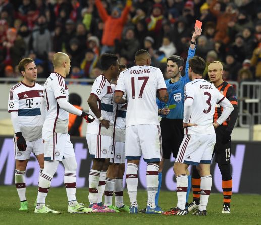 Xabi Alonso was sent off on his 100th European Champions League appearance on a disappointing night for Bayern Munich. The German side was held to a 0-0 draw by Shakhtar Donetsk in the first leg of its last 16 tie.