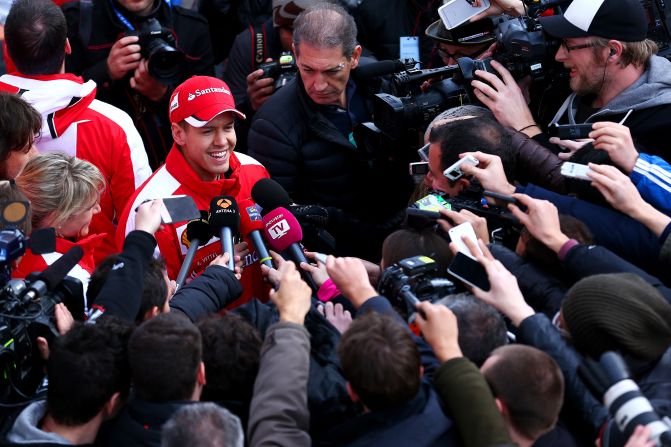 New Ferrari driver Sebastian Vettel was the center of attention from the media scrum as he made his driving debut for the team during the February test.