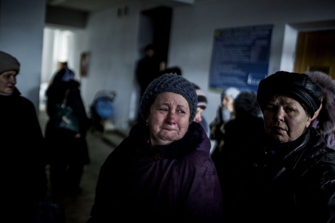 A Ukrainian woman cries in an administration building before taking a bus to flee her town in Debaltseve. <a href="index.php?page=&url=http%3A%2F%2Fcnn.com%2F2015%2F02%2F18%2Feurope%2Fukraine-conflict%2F">Continued conflict there has undermined a truce</a> that apparently went into effect Sunday, raising concerns it is all but dead.