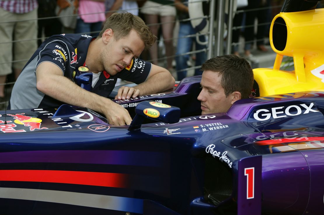 The two Sebs: Four-time F1 world champion Sebastian Vettel shows Ogier around his Red Bull car ahead of the Monaco Grand Prix. The German joined Ferrari at the end of the 2014 season. Ogier's childhood hero was the late F1 star Ayrton Senna.