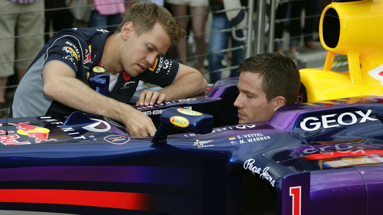The two Sebs: Four-time F1 world champion Sebastian Vettel shows Ogier around his Red Bull car ahead of the Monaco Grand Prix. The German joined Ferrari at the end of the 2014 season. Ogier's childhood hero was the late F1 star Ayrton Senna.