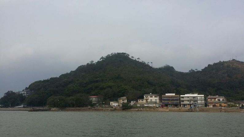 Inhabitants of this nearby village blasted off the protruding rock formation after a feng shui master told them it would stop women leaving the village to become prostitutes. 