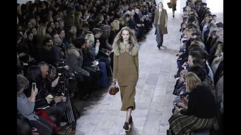 Michael Kors accented chunky knits with fur in one of the looks for his fall collection.