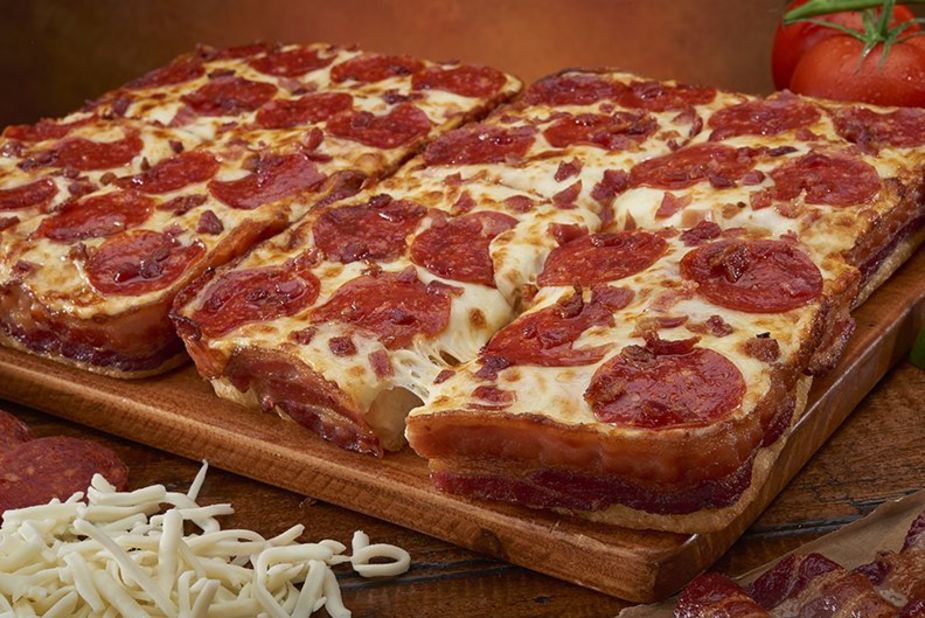 Little Caesars launched a bacon-wrapped pizza in February. A full 3.5 feet of savory meat top and envelop this deep-dish creation.