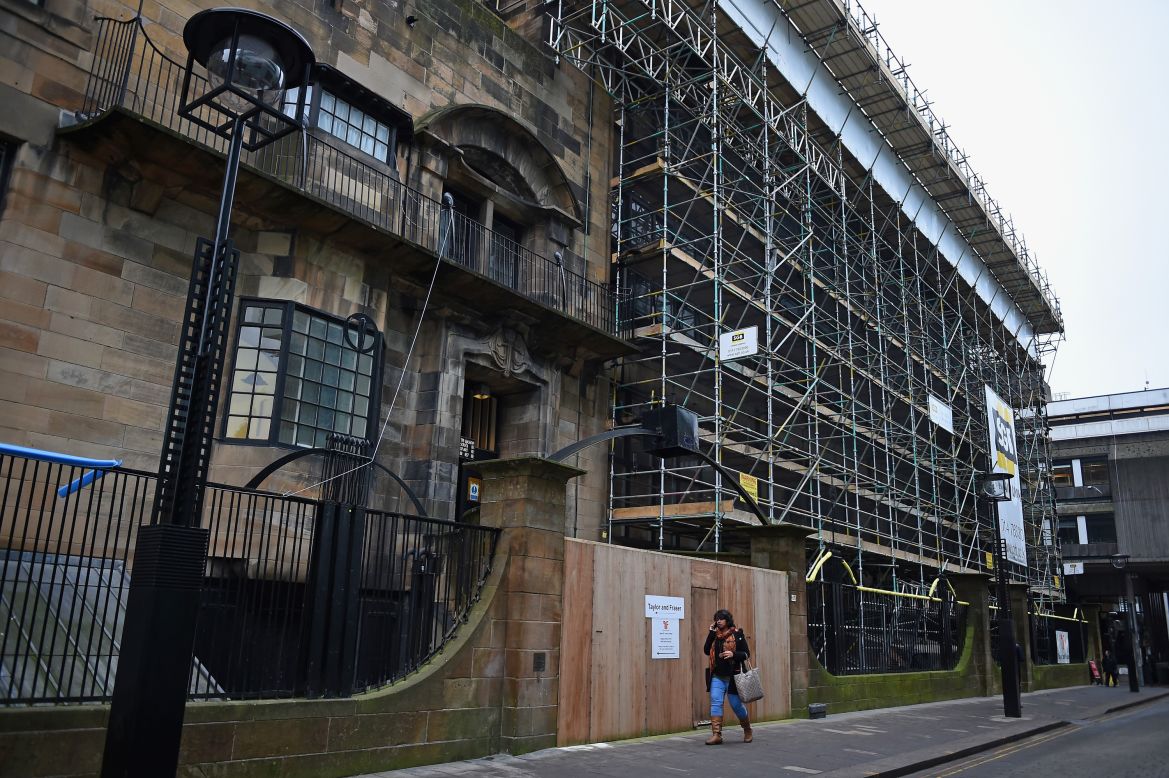 Mackintosh saw elaborate and iconic buildings like the Glasgow School of Art, captured here undergoing post-fire during stabilization work, built during his lifetime.<br /><br />However, he also designed several other buildings, which were not completed while he was alive. 