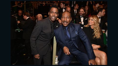Chris Rock, left, introduced Eddie Murphy on Sunday during the "SNL" 40th anniversary special.