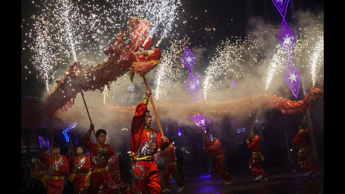 Artists perform at an amusement park during Lunar New Year celebrations in Beijing on Thursday, February 19. The<a href="http://edition.cnn.com/2015/02/12/asia/year-of-the-goat-sheep-ram/index.html"> Year of the Sheep</a> began that Thursday.