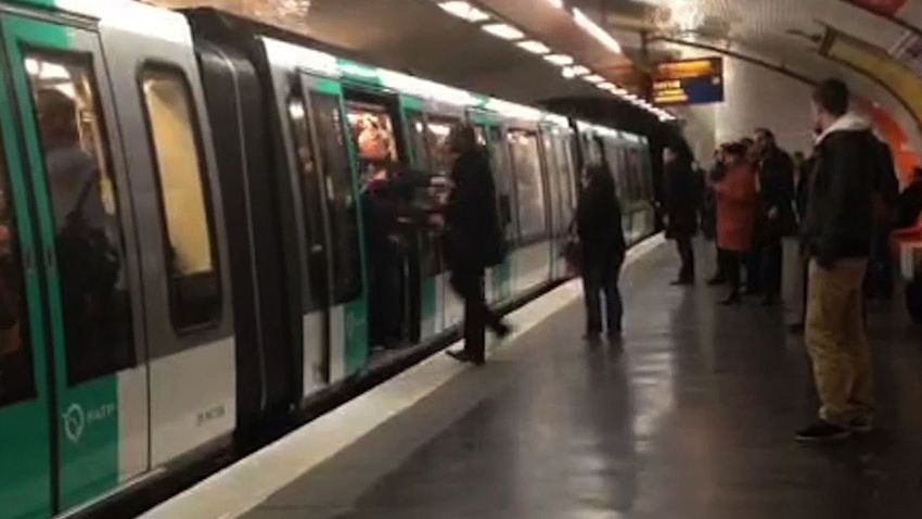 A video grab taken from footage obtained from Guardian News & Media Ltd in the United Kingdom on February 18, 2015 shows Chelsea football fans packed onto a Paris Metro train pushing a passenger to prevent him from boarding the carriage at a station in Paris on February 17, 2015. Chelsea Football Club said on February 18 it was prepared to ban self-proclaimed racist fans who were filmed preventing a black man from boarding a Paris subway train, saying their behaviour was 'abhorrent'. Amateur footage obtained by The Guardian newspaper captured the incident in a Metro station shortly before Chelsea's Champions League march with Paris Saint-Germain in the French capital on Tuesday evening. The unidentified black man repeatedly tried to squeeze into the carriage and they aggressively pushed him back. The film then cuts to them chanting: 'We're racist, we're racist, and that's the way we like it.' AFP PHOTO / GUARDIAN NEWS & MEDIA LTD (Photo credit should read -/AFP/Getty Images)