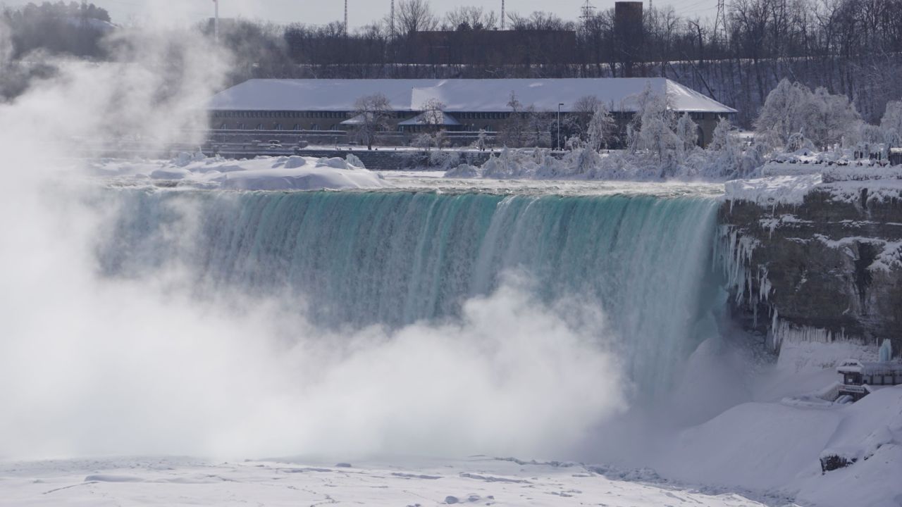 The National Weather Service said <a href="http://www.cnn.com/2015/02/19/travel/feat-great-lakes-niagara-falls-frozen/index.html">extremely cold Arctic</a> air allows for expansion of ice -- sometimes called an "ice bridge" -- across the river. 