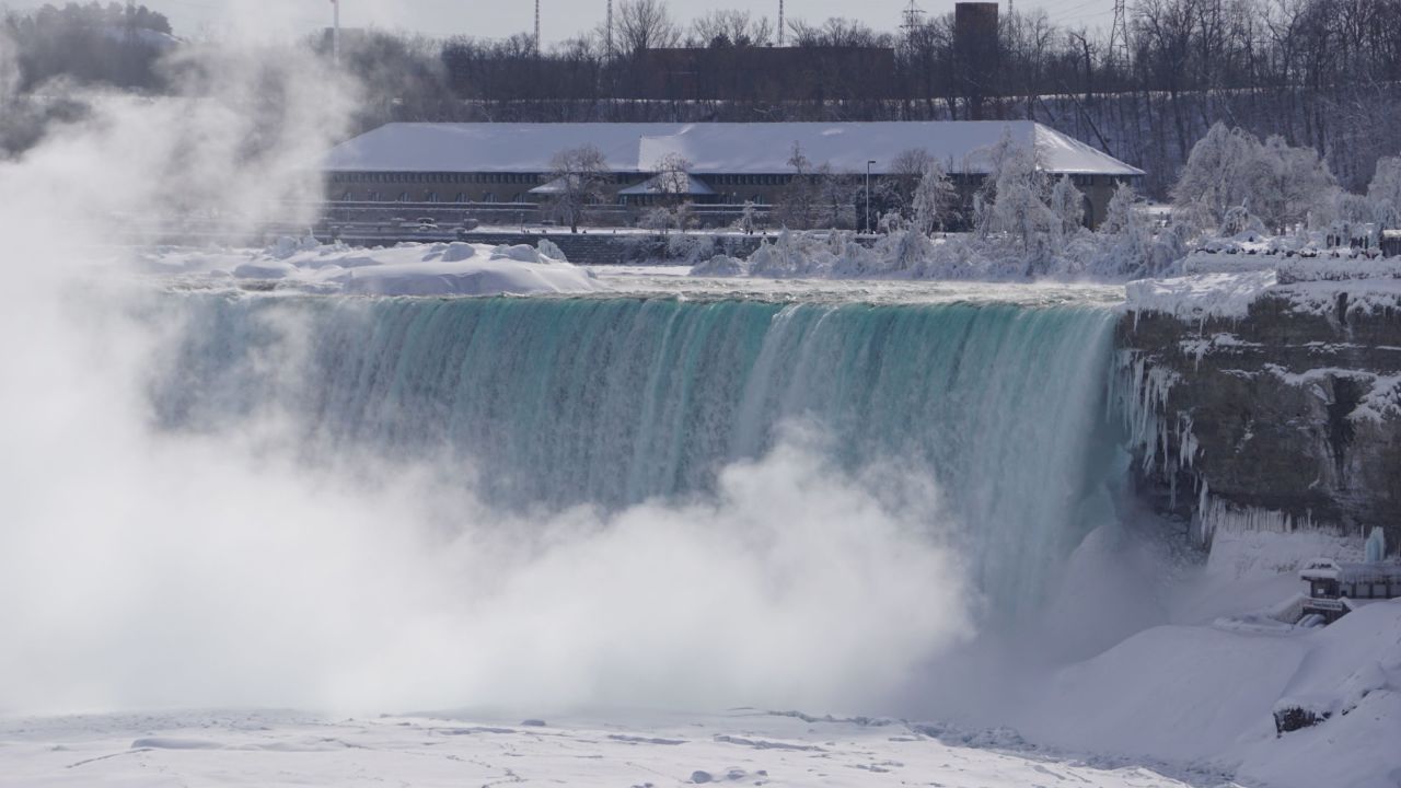 The National Weather Service said <a href="http://www.cnn.com/2015/02/19/travel/feat-great-lakes-niagara-falls-frozen/index.html">extremely cold Arctic</a> air allows for expansion of ice -- sometimes called an "ice bridge" -- across the river.