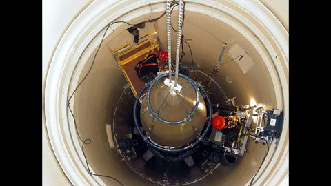 In this undated image released by the U.S. Air Force, a maintenance team from Montana's Malmstrom Air Force Base removes the upper section of an intercontinental ballistic missile. Missile launch officers at the base's Global Strike Command were recently caught <a href="http://www.cnn.com/2014/03/27/us/air-force-cheating-investigation/" target="_blank">cheating on proficiency exams.</a>