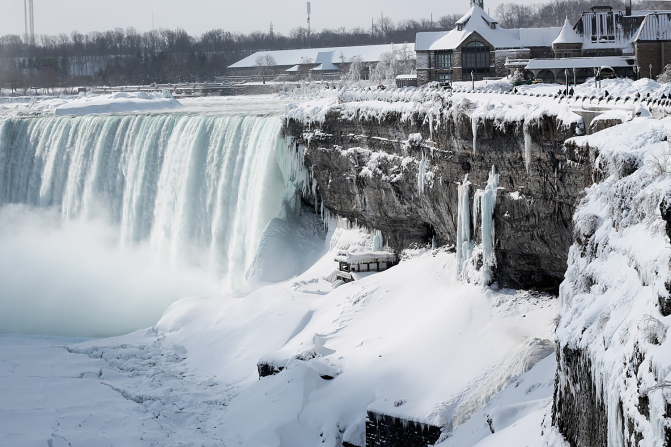 An unprecedented cold front has frozen parts of Niagara Falls, drawing tourists to document the rare event. The minus 22-degree weather didn't stop iReporter <a href="http://ireport.cnn.com/docs/DOC-1217563">Spencer Wyllie</a> from capturing the beauty of the falls on Thursday.