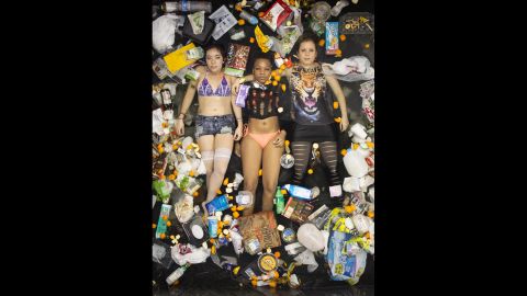 Roommates pose for Gregg Segal's "7 days of Garbage" series