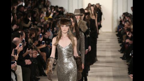 Ralph Lauren paired fur-like and Western-inspired accessories with his signature polished aesthetic.
