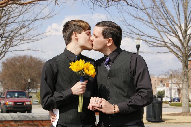 Justin Lewis, 28, left, and Shawn Williams, 29, share a kiss after their wedding on Monday, February 9, 2015, at the Lee County Courthouse in Alabama. They live in Salem, Alabama.