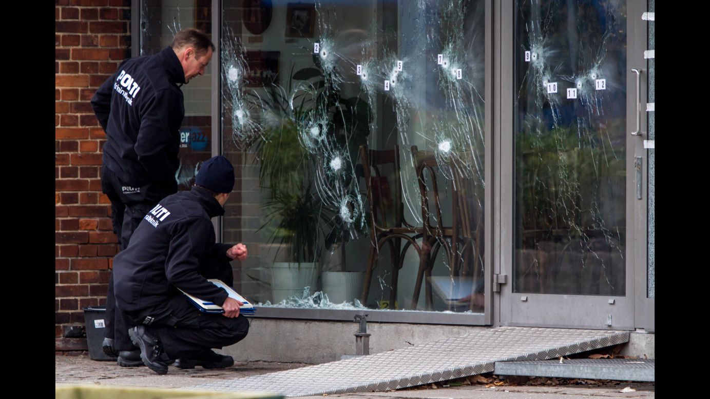 Investigators in Copenhagen, Denmark, work at the scene of a cafe shooting on Monday, February 16. A day earlier, Danish police shot and killed the man suspected of carrying out the attack and another at a Copenhagen synagogue. Two people were killed <a href="http://www.cnn.com/2015/02/14/world/gallery/denmark-shooting/index.html" target="_blank">in the attacks.</a>
