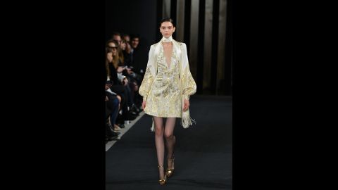 J. Mendel's collection embraced fall's <a href="http://www.cnn.com/2015/02/13/living/feat-nyfw-fall-2015-forecast/">1970s trend</a> with skinny scarves and gold jacquard.