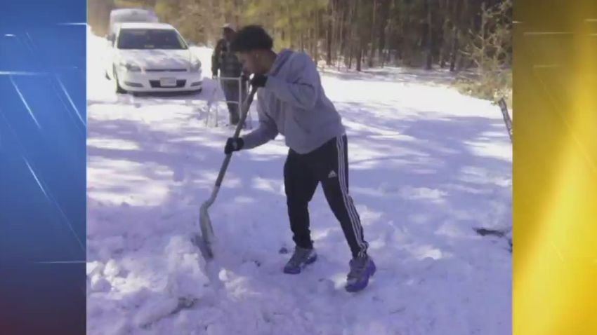 pkg virginia teen helps elderly man shovel_00005310.jpg