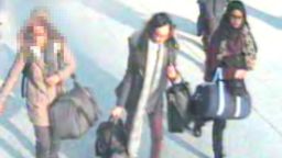 UK police say this image shows 16-year-old Kadiza Sultana, center, and 15-year-old Shamima Begum, right, at London Gatwick Airport on Tuesday.