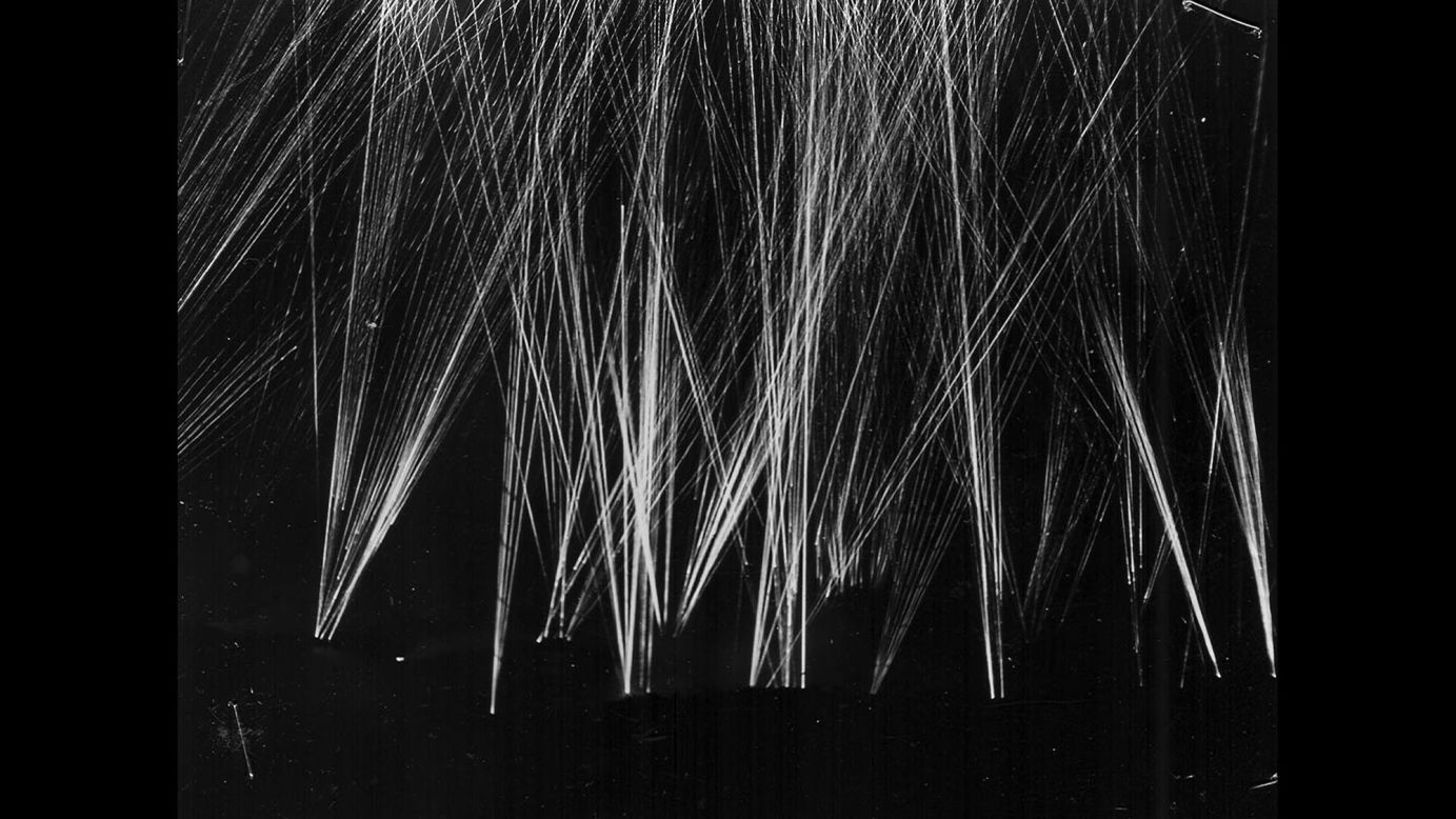 US anti-aircraft tracers light the sky over Iwo Jima as American forces repel a Japanese air attack.