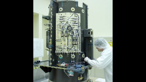 A worker checks the xenon feed system on Dawn.