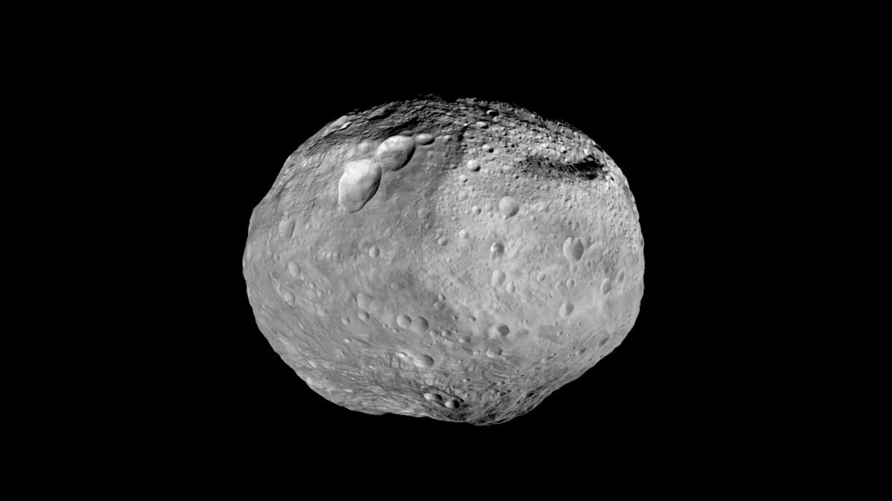 As the spacecraft prepared to leave Vesta behind, scientists created this mosaic of the best views taken during Dawn's stay.