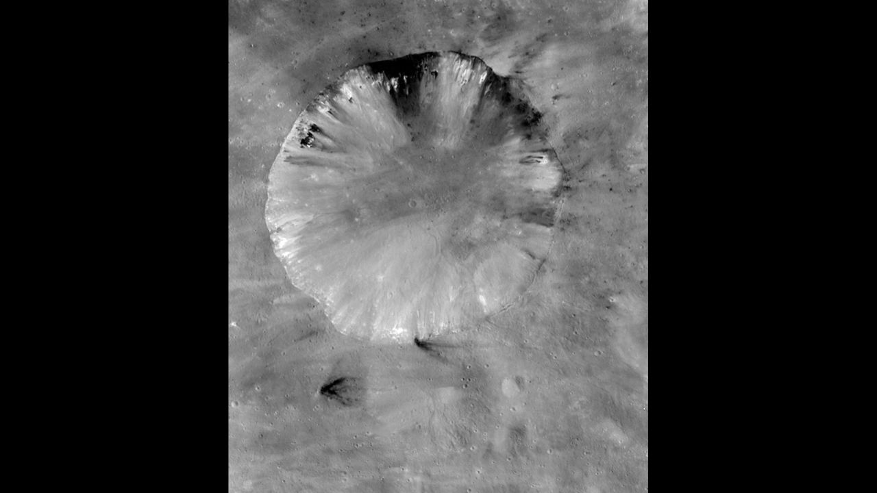 This is Vesta's Numisia crater. It's about 19 miles (31 kilometers) in diameter.