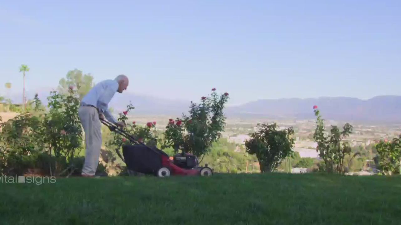 Dr. Ellsworth Wareham mowing his lawn at age 100 (photo 2015)