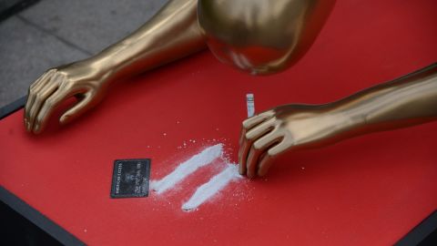 Artist 'Plastic Jesus' showcased a life-size Oscar-inspired statue snorting what looks like cocaine.