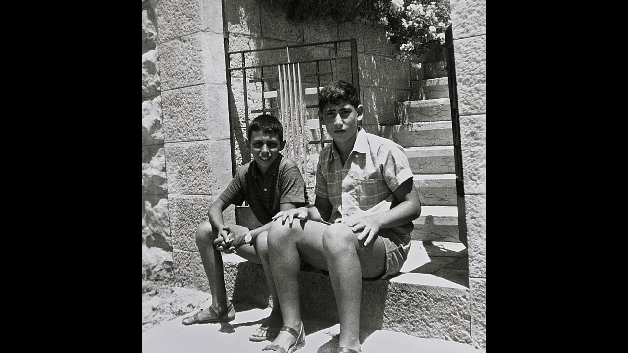 Netanyahu, right, sits with a friend at the entrance to his family home in Jerusalem on July 1, 1967. The Israeli prime minister was born October 21, 1949.