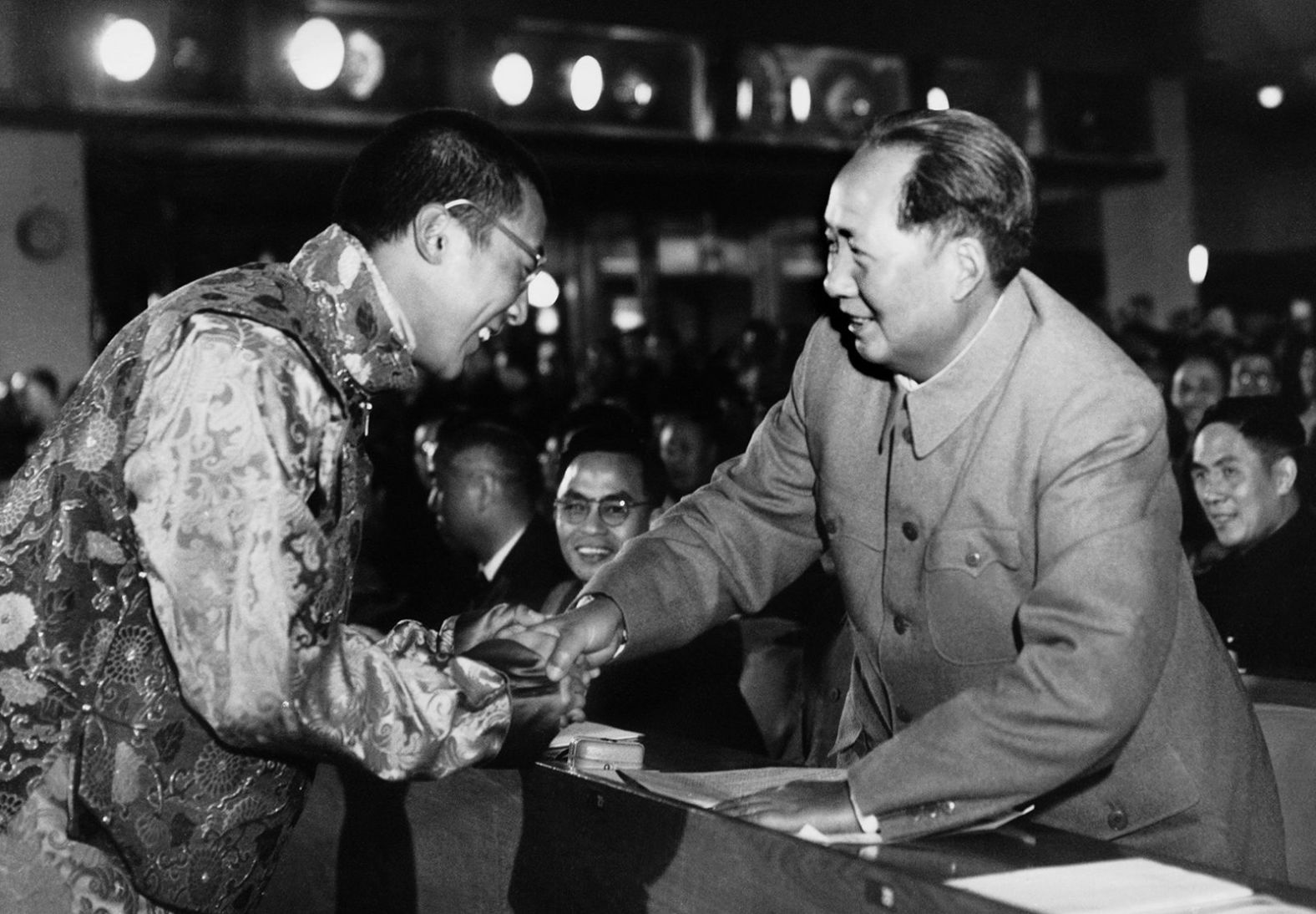 The Dalai Lama shakes hands with Chinese communist leader Mao Zedong in 1954. Up until 1959, the Dalai Lama participated in unsuccessful peace talks with Chinese officials in Beijing.