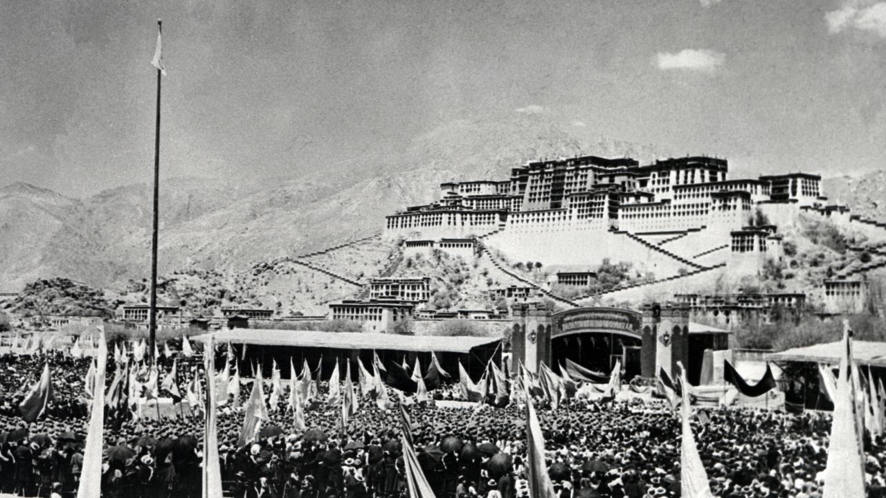 Tibetans gather during an armed uprising against Chinese rule on March 10, 1959, in front of the Potala Palace in Lhasa.