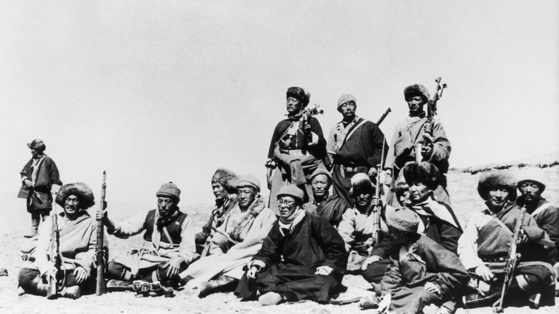 Fearing for his life, the Dalai Lama (sixth from left) flees Tibet in March 1959 and heads across the Himalayas to India disguised as a soldier. The Dalai Lama has long denied China's assertion that he's seeking Tibetan independence. He says he wants only enough autonomy to protect its traditional Buddhist culture. Beijing rejects accusations of oppression, saying that under its rule, living standards have greatly improved for the Tibetan people. It makes centuries-old historical claims on the region.