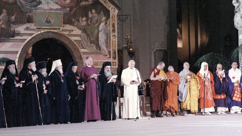 In 1986,<a > Pope John Paul II</a> prays with representatives of 12 world religions, including the Dalai Lama. The World Day of Prayer for Peace was held at the Basilica of St. Mary of the Angels and the Martyrs in Assisi, Italy.