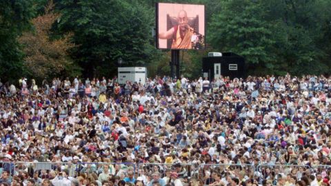 A crowd gathers at New York's Central Park to listen to the Dalai Lama speak in 1999. In 2002, he speaks out against China, stating that China should embrace democracy if the country is to be a major world power in the coming years. He also criticizes the United States-led war on terrorism, saying that the use of force to override terrorists overlooks the underlying problems that lead to terrorism.