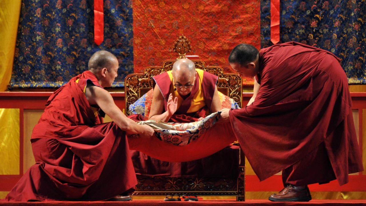 The Dalai Lama blesses gifts during a ceremony in September 2009 to comfort victims of Typhoon Morakot in Kaohsiung, Taiwan.