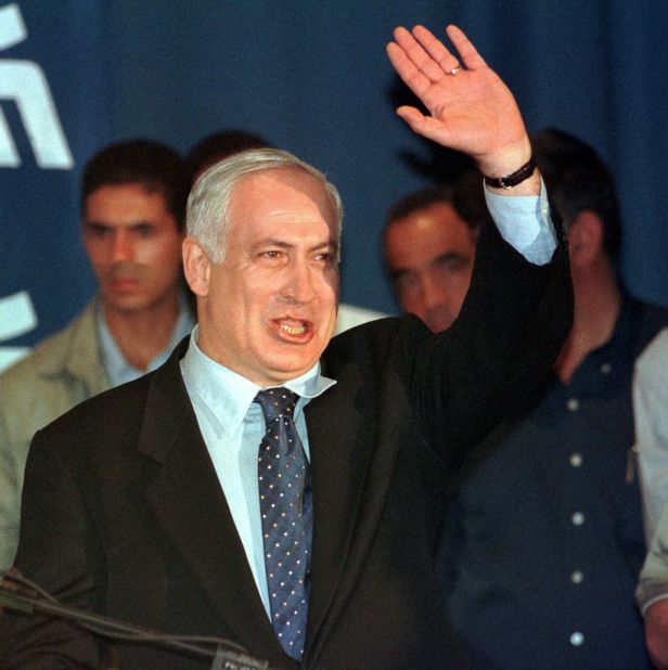 Netanyahu thanks a crowd of supporters at a Likud party meeting in Tel Aviv, Israel, in May 1999. The outgoing Prime Minister announced that he was quitting the Knesset and stepping down as party leader 10 days after being defeated in elections.