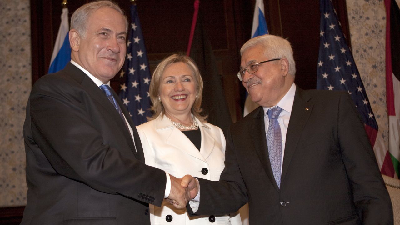 US Secretary of State Hillary Clinton looks on as Abbas and Netanyahu shake hands in Sharm El-Sheikh, Egypt, in September 2010 during a second round of Middle East peace talks.