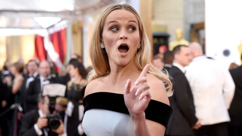 Reese Witherspoon arrives at the 87th Academy Awards in Hollywood. She is one of several celebs calling for more substance to red carpet interviews beyond "Who are you wearing?" - prompting the social media hashtag<a href="index.php?page=&url=http%3A%2F%2Fwww.cnn.com%2F2015%2F02%2F23%2Fpolitics%2Foscars-get-political%2Findex.html"> #AskHerMore</a>. Click through the gallery for more from the 2015 Oscars.