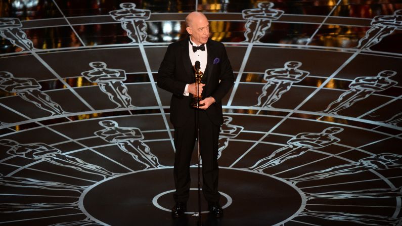 J.K. Simmons accepts the best supporting actor Oscar for his role in "Whiplash." In the first acceptance speech of the night, he paid tribute to his family, praising his wife and his "above-average" children. He also put in a plug for actual phone calls. "Call your mom, call your dad; don't text, don't email; tell them you love them," he said.