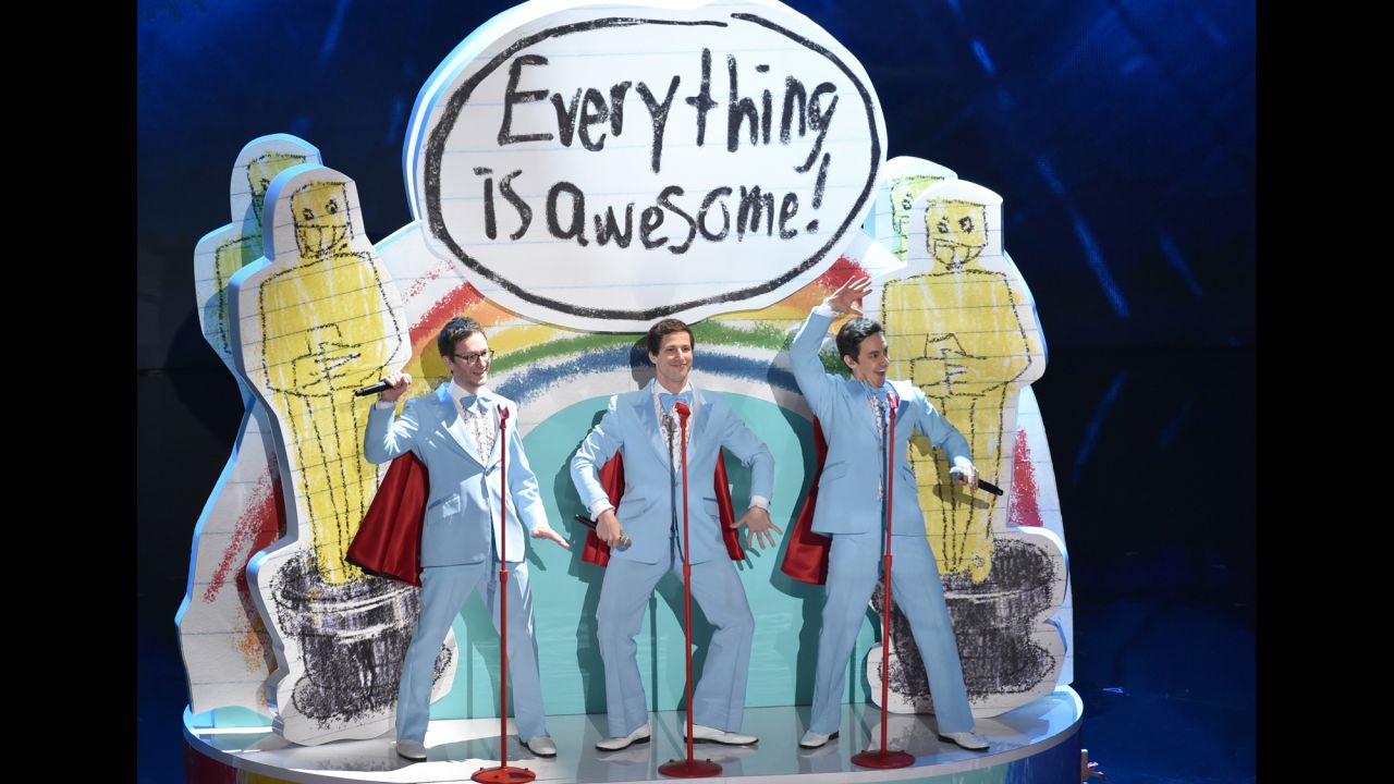 From left, Akiva Schaffer, Andy Samberg and Jorma Taccone of The Lonely Island take the stage for a rendition of the Oscar-nominated Tegan and Sara song "Everything is Awesome" from "The Lego Movie."