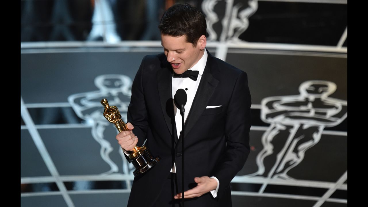 "The Imitation Game" screenwriter Graham Moore accepts the award for the best adapted screenplay. "When I was 16 years old, I tried to kill myself because I felt weird. And I felt different. And I felt like I didn't belong," he said. "And now I'm standing here, and so I would like for this moment to be for that kid out there who feels like she's weird or she's different or she doesn't fit in anywhere. Yes, you do. I promise you do. You do. Stay weird; stay different."
