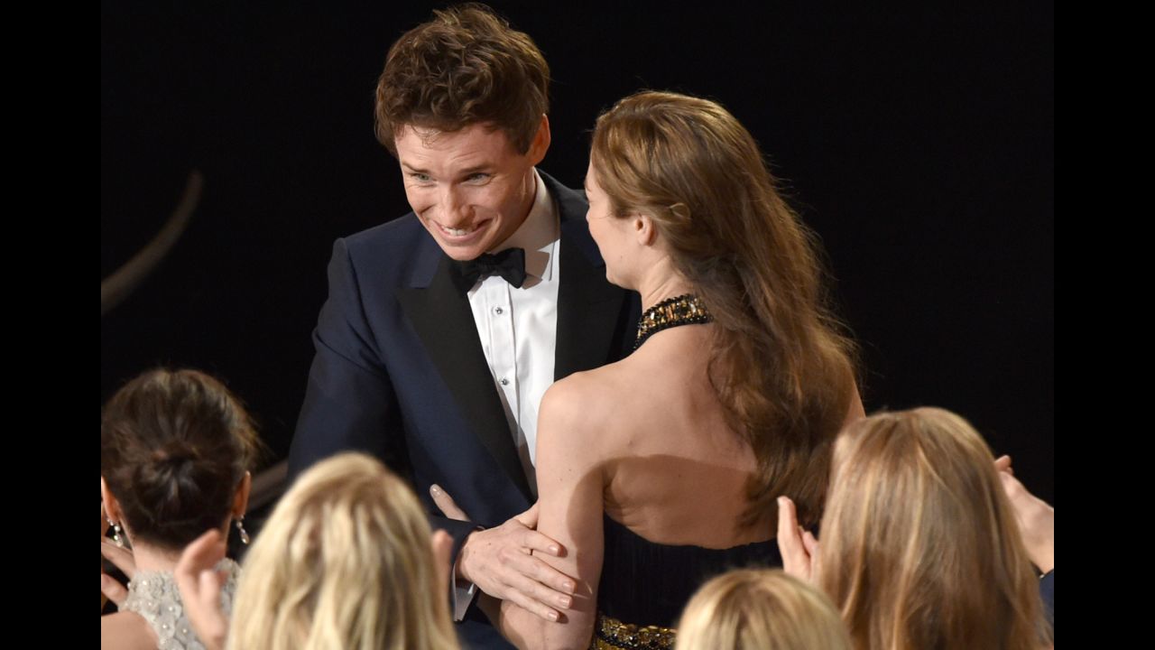 Eddie Redmayne is congratulated after winning best actor for his performance as Stephen Hawking in "The Theory of Everything."